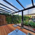 Gardendreams Legend Gartenzimmer mit Bangkirai Terrasse und Glasdach