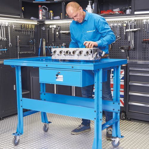 Verrijdbare werkbank met olieopvangbak